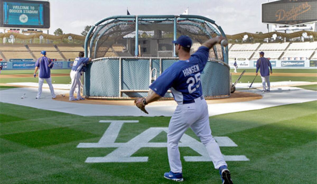 Former Dodgers hitting coach Dave Hansen, shown in April 2011, has been hired by the Seattle Mariners for the same position.