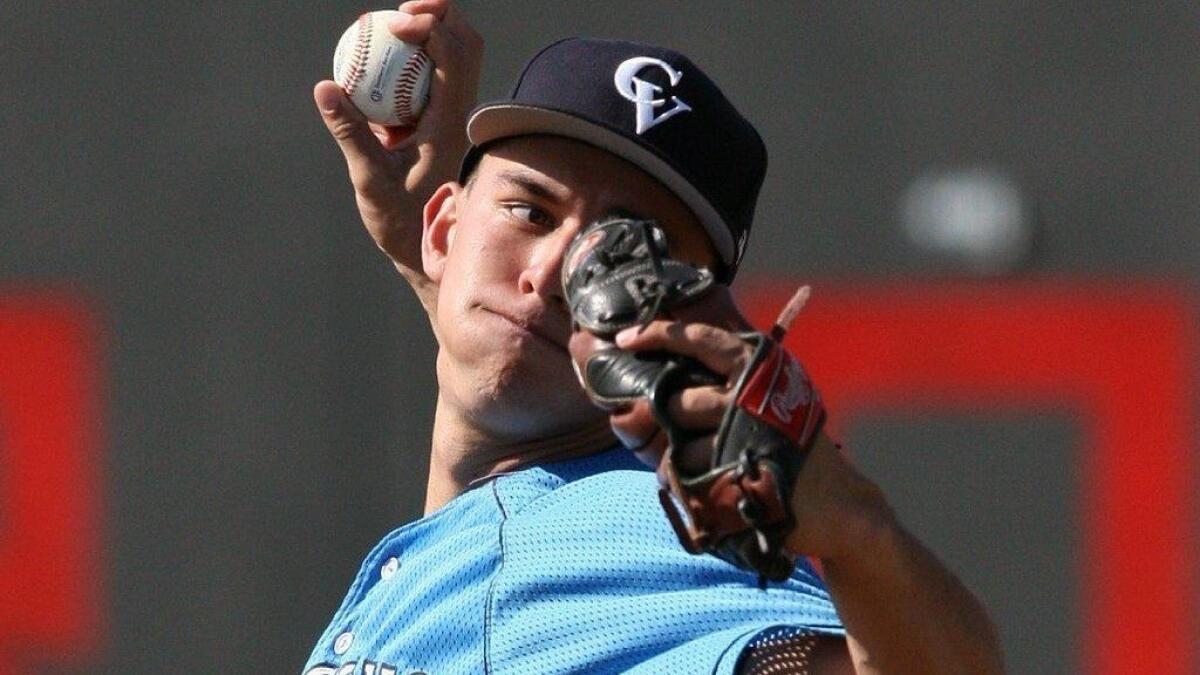Crescenta Valley's Will Smiley pitches against Glendale High.