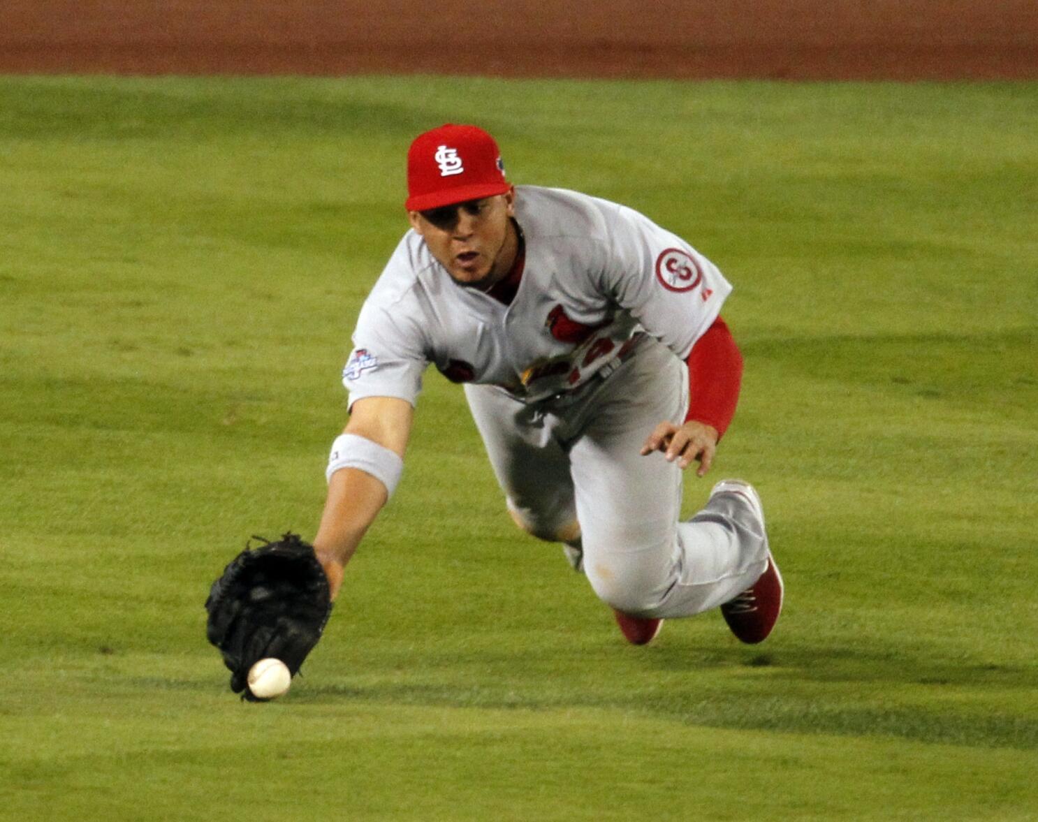 New York's centerfielder Carlos Beltran drives the ball to the