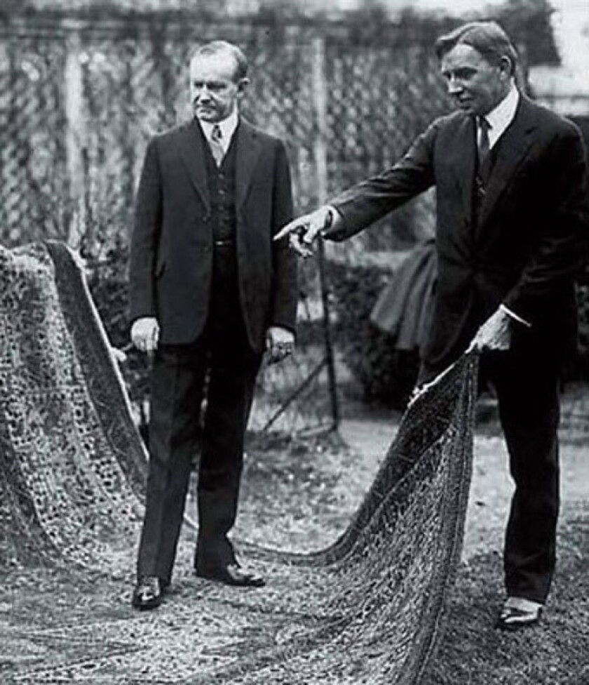President Calvin Coolidge pictured standing on the rug with Near East Relief Vice-Chairman, Dr. John Finley.