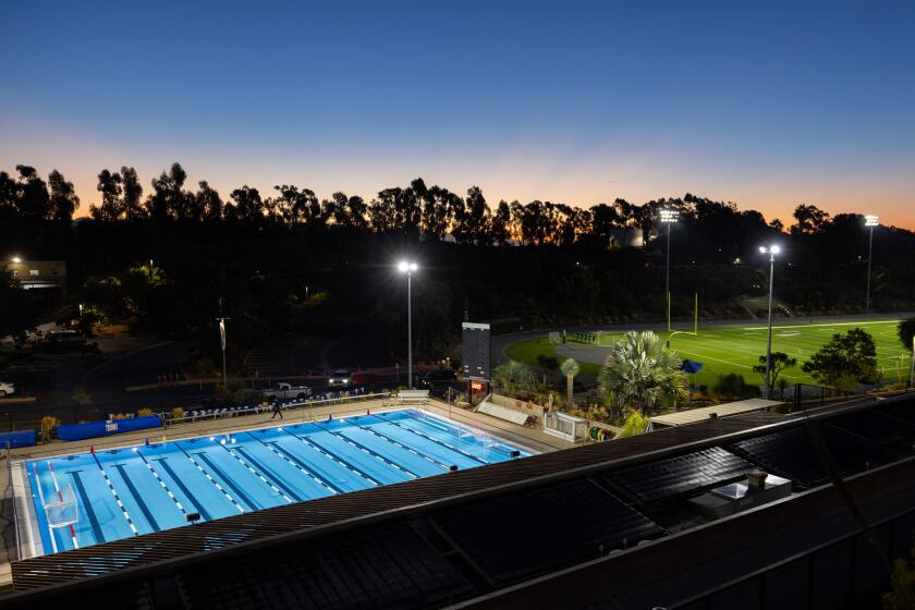 West Los Angeles, CA - August 21: The Brentwood School pool and football field are on land leased from the Department of Veterans Affairs on Wednesday, Aug. 21, 2024 in West Los Angeles, CA. (Brian van der Brug / Los Angeles Times)