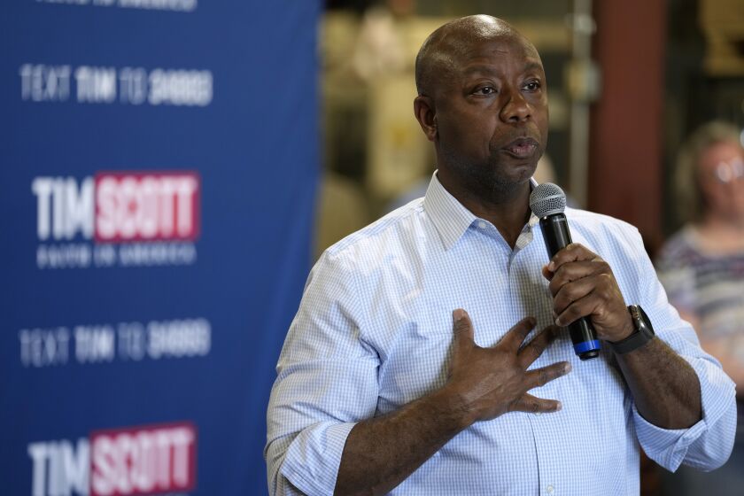 Republican presidential candidate South Carolina Sen. Tim Scott speaks during a town hall meeting, Wednesday, May 24, 2023, in Sioux City, Iowa. (AP Photo/Charlie Neibergall)