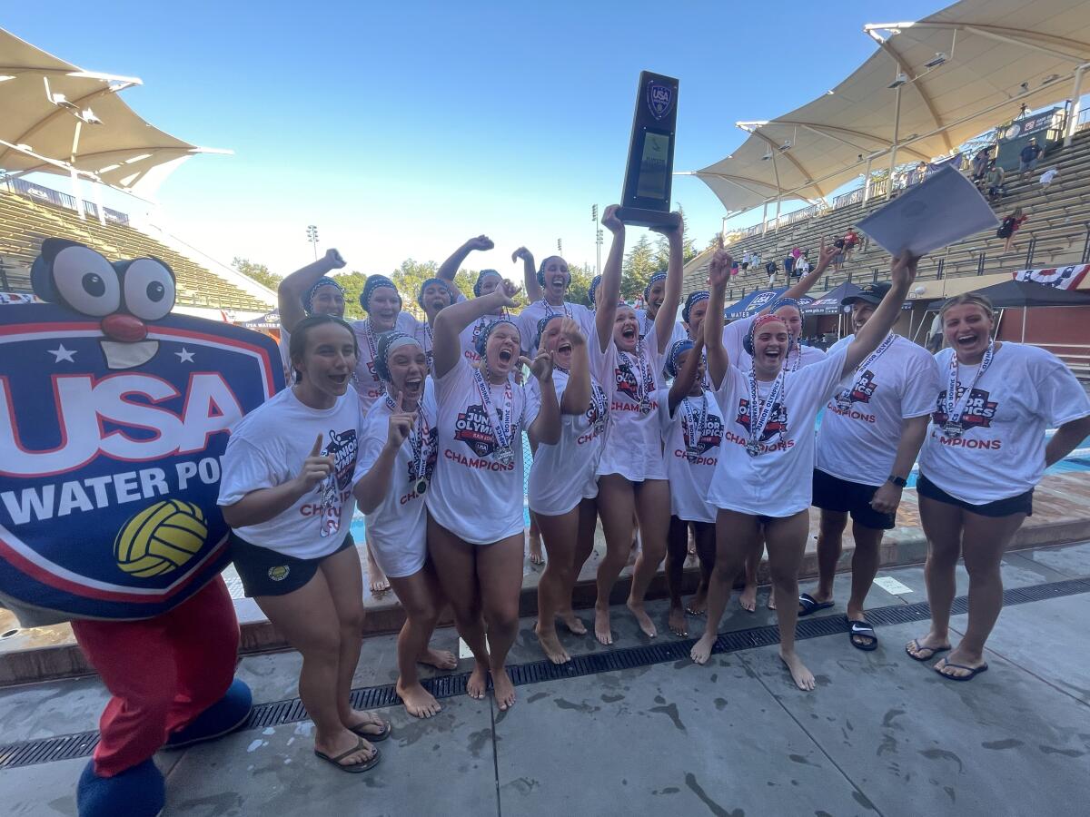 The Newport Beach Water Polo Club 18-and-under girls celebrate after winning the USA Water Polo Junior Olympics title.