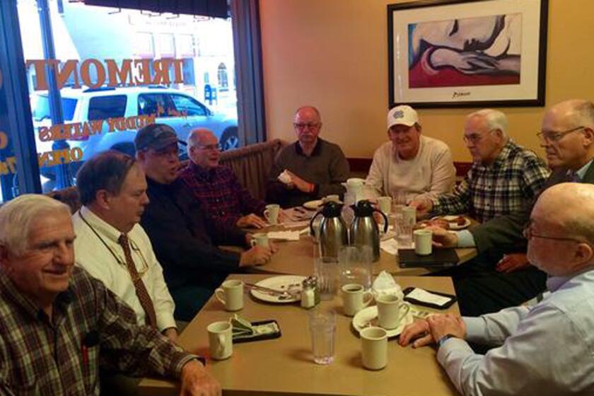 Each weekday morning, members of a Marshalltown coffee club gather for breakfast and conversation. Their views on immigration are more nuanced and complex than the heated politics on the campaign trail would suggest.
