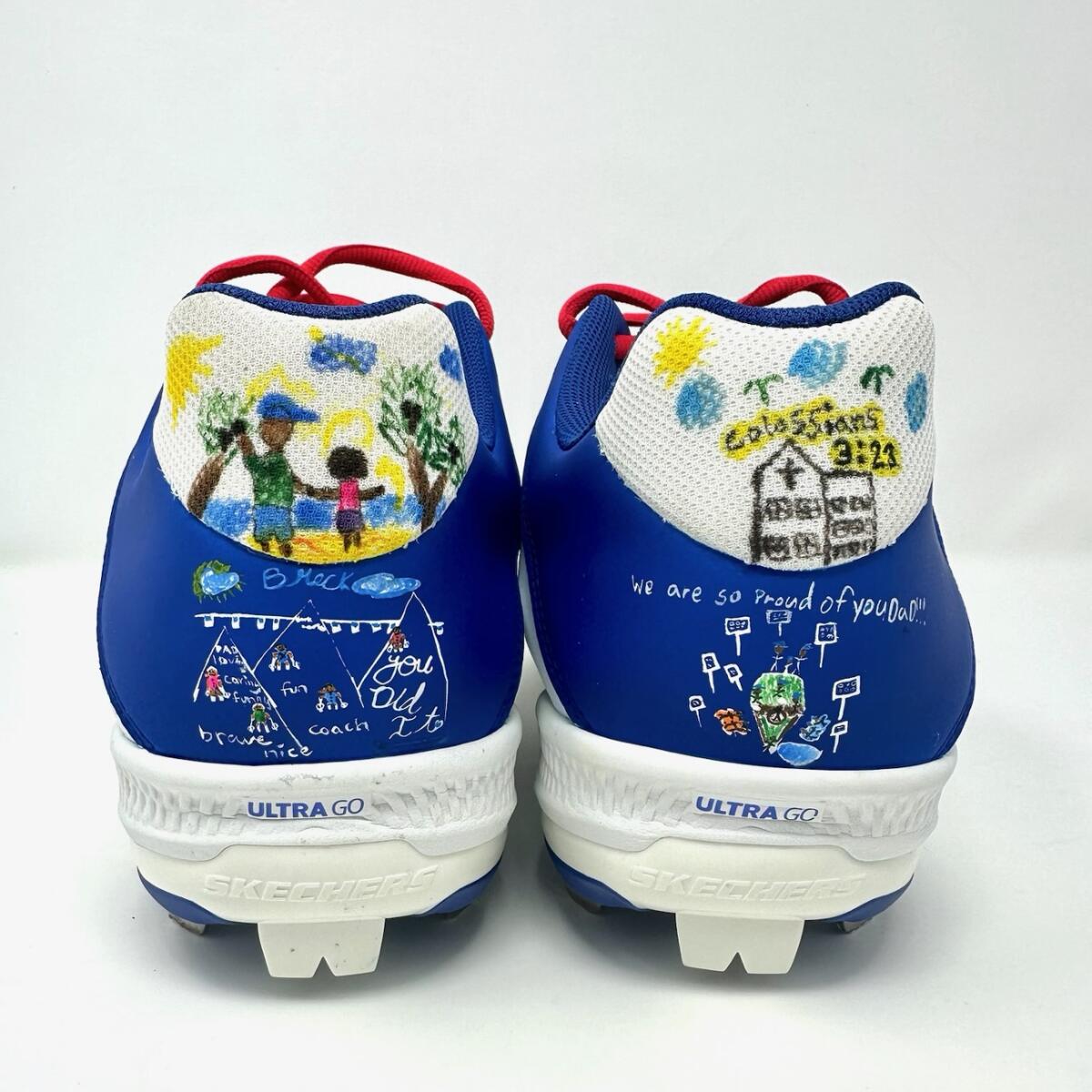 The back Clayton Kershaw's custom cleats feature artwork from his children