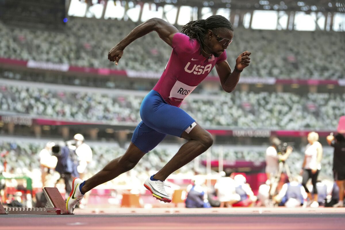 FILE - Randolph Ross, of United States, starts a heat in the men's 400-meter run at the 2020 Summer Olympics, on Aug. 1, 2021, in Tokyo. Ross, the back-to-back NCAA champion, was booted from world championships, about a month after officials could not locate him for an antidoping test. The Athletics Integrity Unit said Ross was provisionally suspended for tampering with the antidoping process after an unsuccessful attempt to test him on June 18. (AP Photo/Martin Meissner, File)