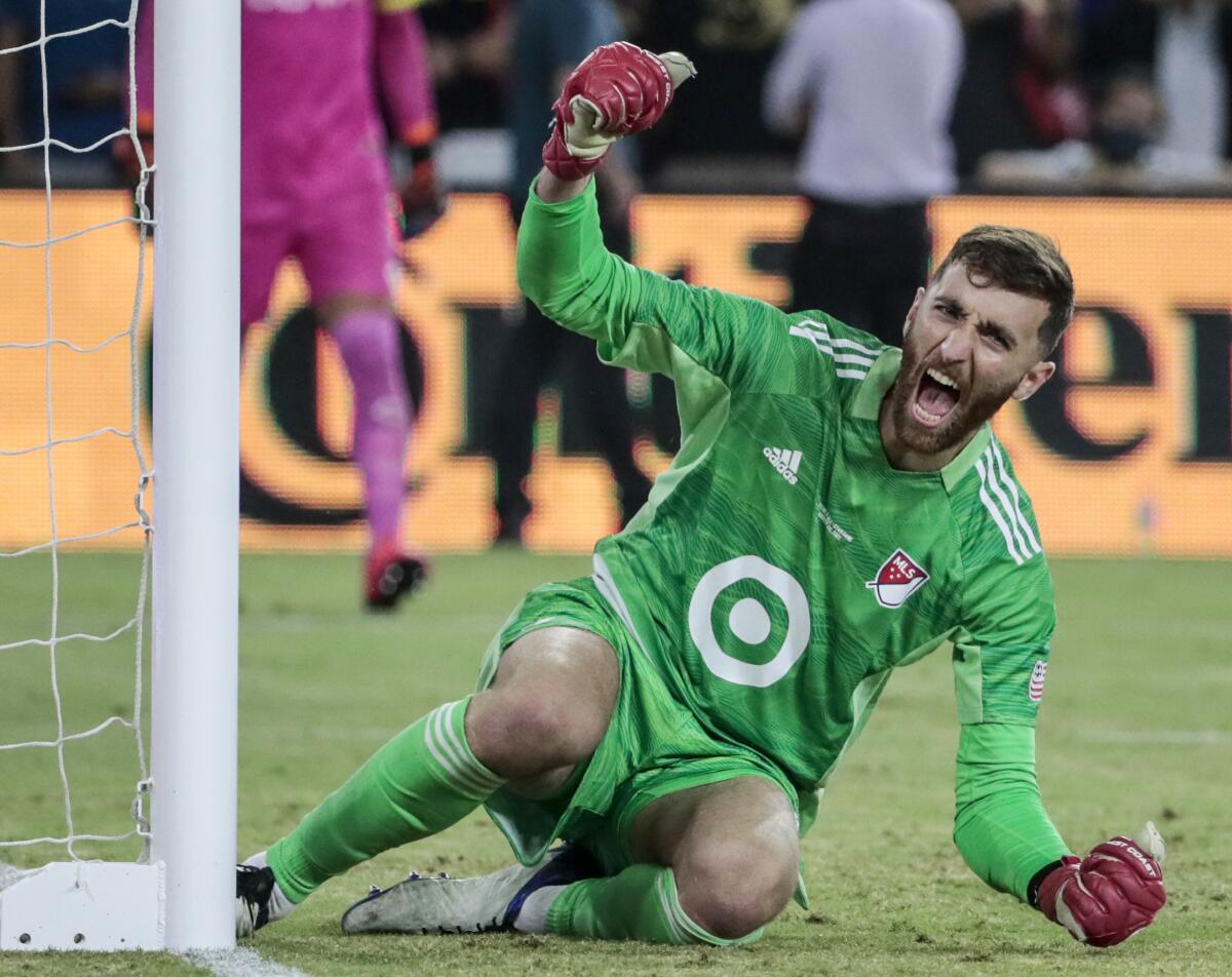 MLS goalie Matt Turner celebrates after turning away a penalty kick to help defeat Liga MX 