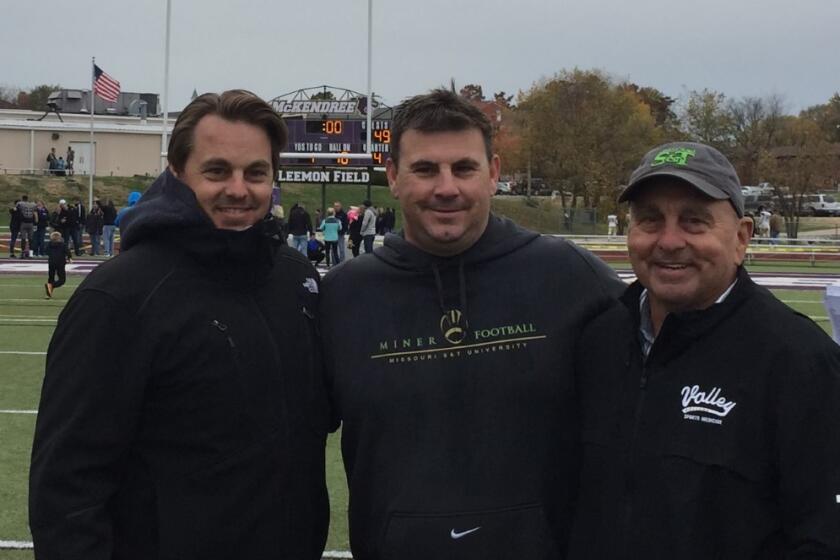 Jim Fenwick (right) with sons Casey and Tyler. 