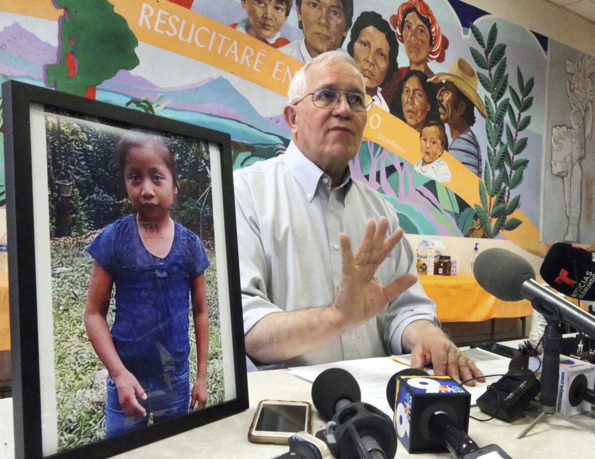 Ruben Garcia, director of Annunciation House, answers media questions in El Paso in December after reading a statement from the family of Jakelin Caal Maquin.