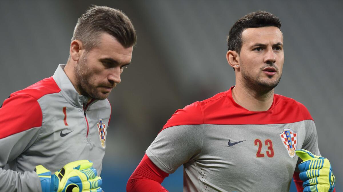 Croatia goalkeepers Stipe Pletikosa, left, and Danijel Subasic take part in a training session in Sao Paulo on Wednesday.