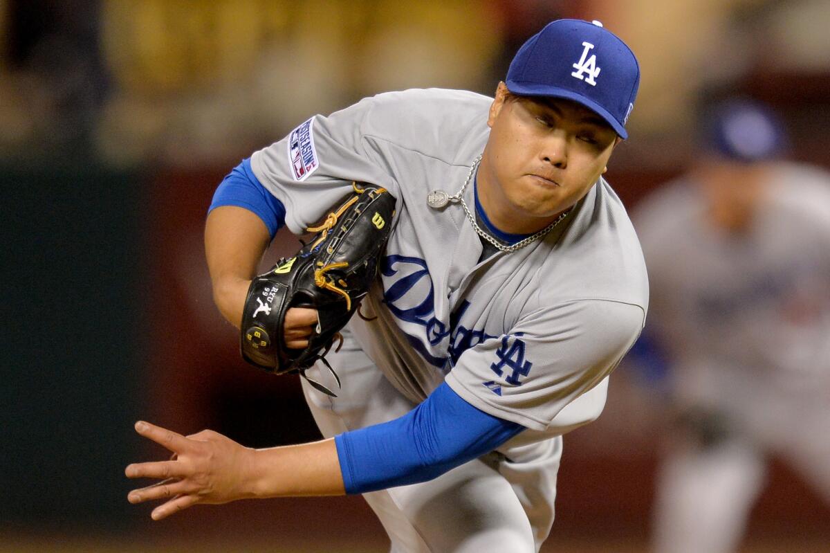 Hyun-Jin Ryu pitches against the St. Louis Cardinals in Game 3 of the National League Division Series at Busch Stadium on Oct. 6.