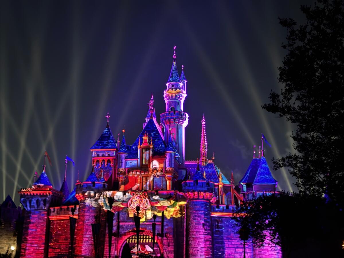 The Sleeping Beauty Castle lit up for “Wondrous Journeys” Nighttime Spectacular.