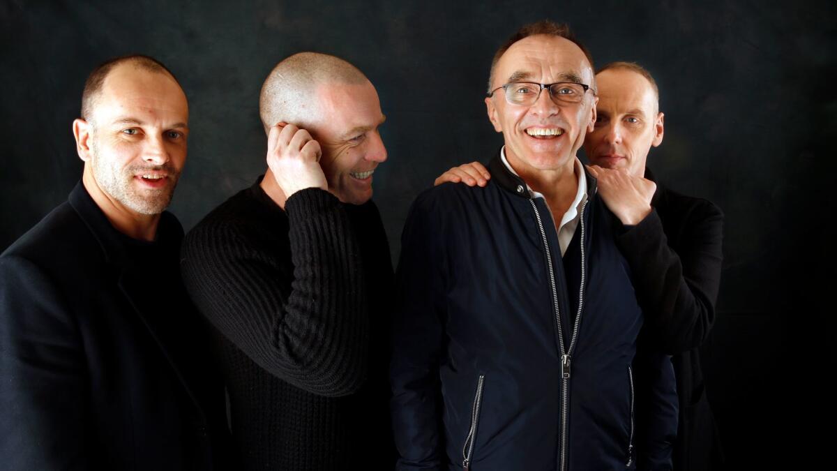 Director Danny Boyle, third from left, along with Jonny Lee Miller, left, Ewan McGregor, second from left, and Ewen Bremner, right, of Trainspotting as they reunite for a sequel 20 years later.