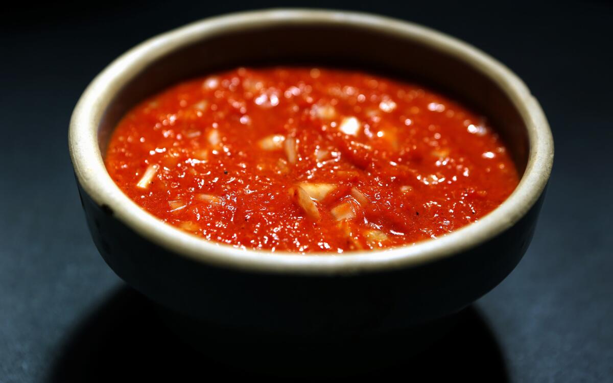 Druze secret sauce (roasted red pepper puree with onion shards)