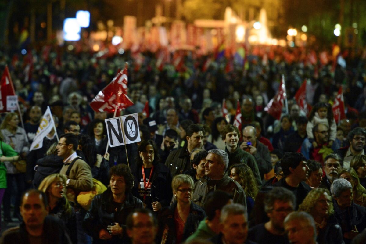Protesters turn out in Madrid for a general strike over austerity measures.