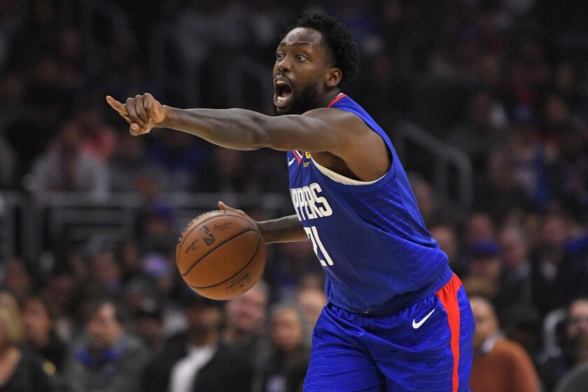 Los Angeles Clippers guard Patrick Beverley gestures during the first half of an NBA basketball game.