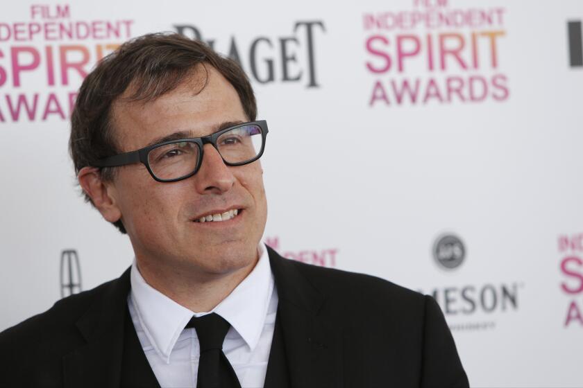David O. Russell arrives at the Film Independent Spirit Awards in February in Santa Monica.