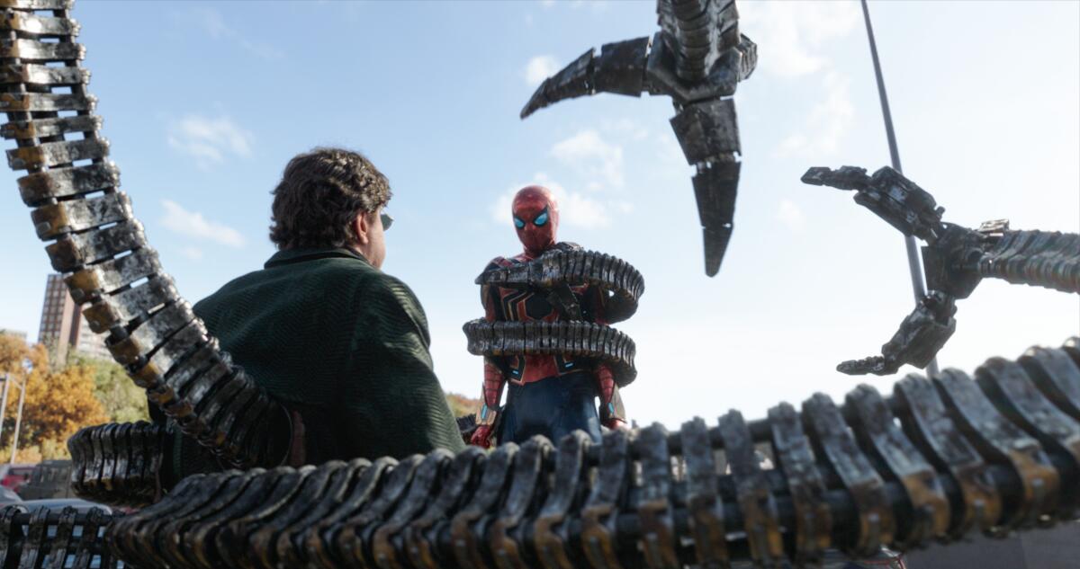 Doc Ock (Alfred Molina) and Spider-Man battle it out in Columbia Pictures' SPIDER-MAN: NO WAY HOME. 