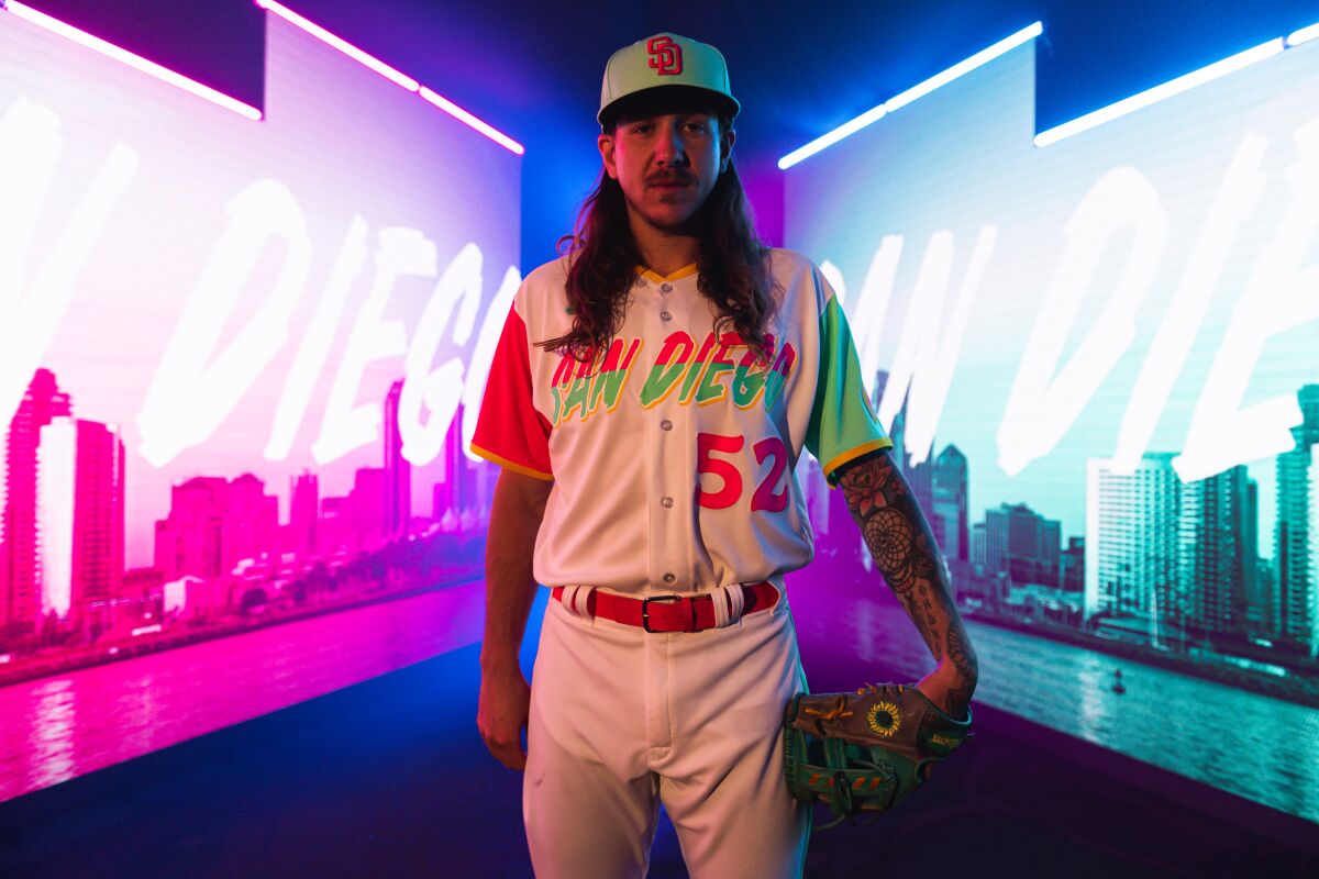 Padres pitcher Mike Clevinger models the team's new City Connect uniforms.