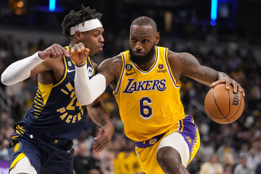 Los Angeles Lakers forward LeBron James (6) drives on Indiana Pacers guard Buddy Hield.