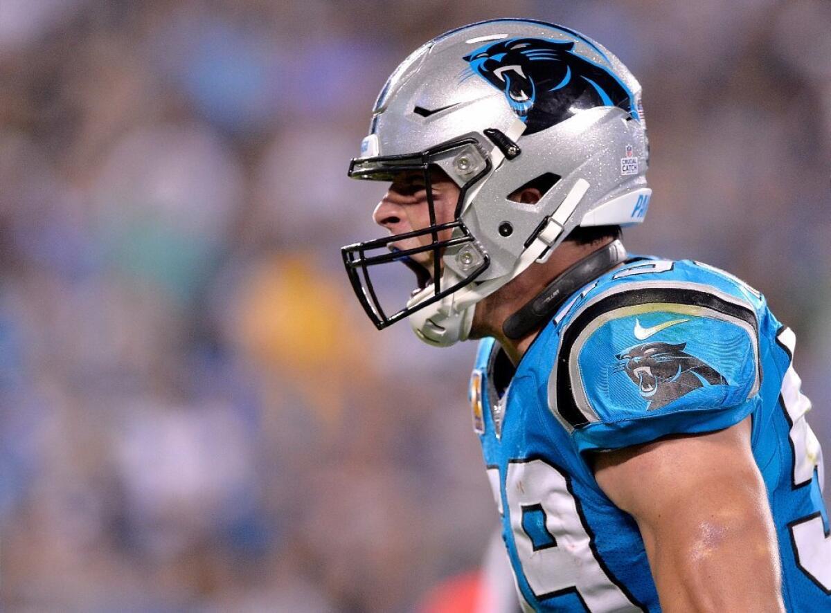 Carolina Panthers linebacker Luke Kuechly reacts after making a tackle for a loss against the Philadelphia Eagles during a game at Bank of America Stadium.