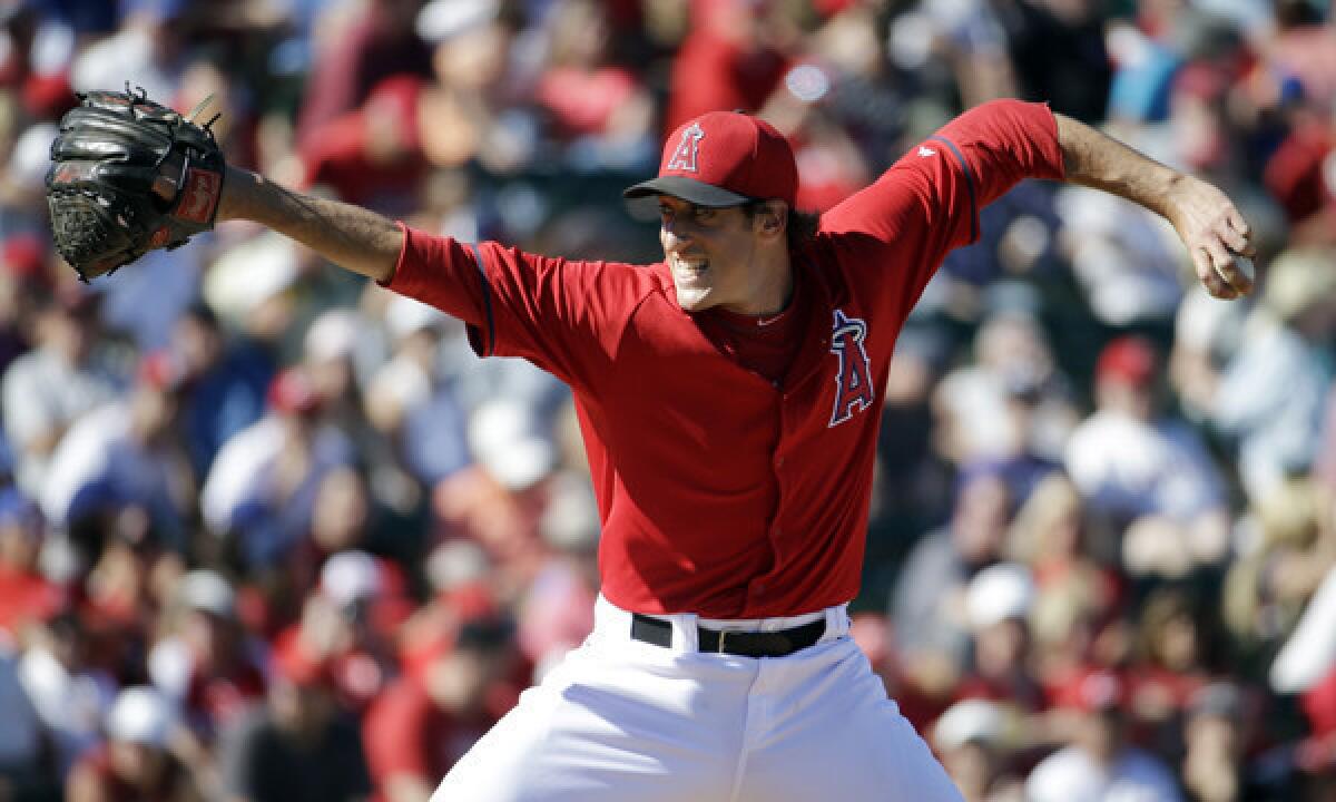 Angels reliever Brian Moran throws during an exhibition game against the Cincinnati Reds in March. Moran is scheduled to undergo Tommy John surgery this week.