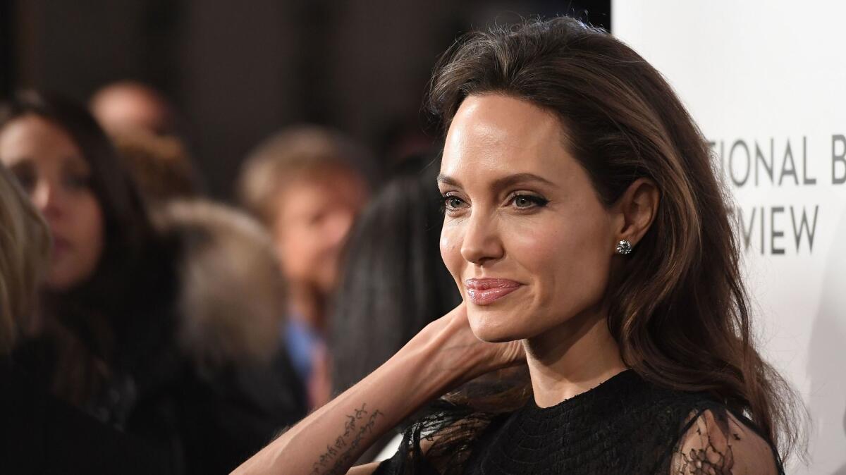 Actress Angelina Jolie, shown at the National Board of Review Awards Gala in New York this month, adopted a child from Ethiopia. Lawmakers there voted to ban foreign adoptions of Ethiopian children.