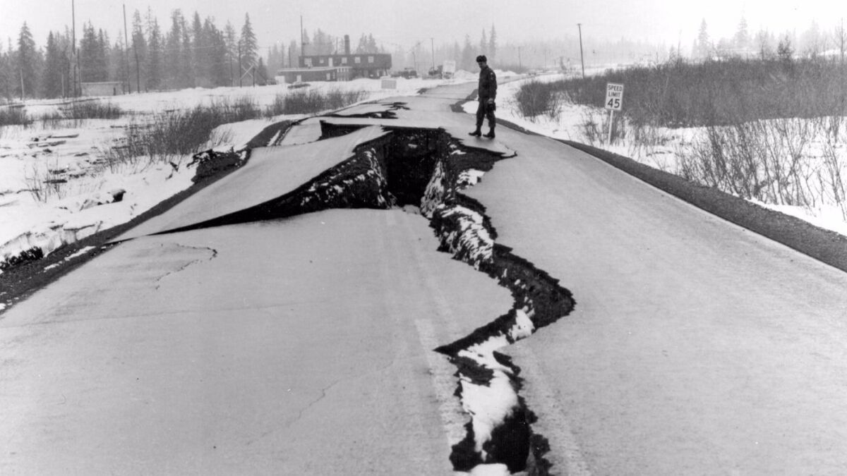 Magnitude 9.2: In this March 27, 1964, photo released by the U.S. Geological Survey, Seward Highway near Anchorage is badly damaged after the massive quake off Alaska. (Associated Press)
