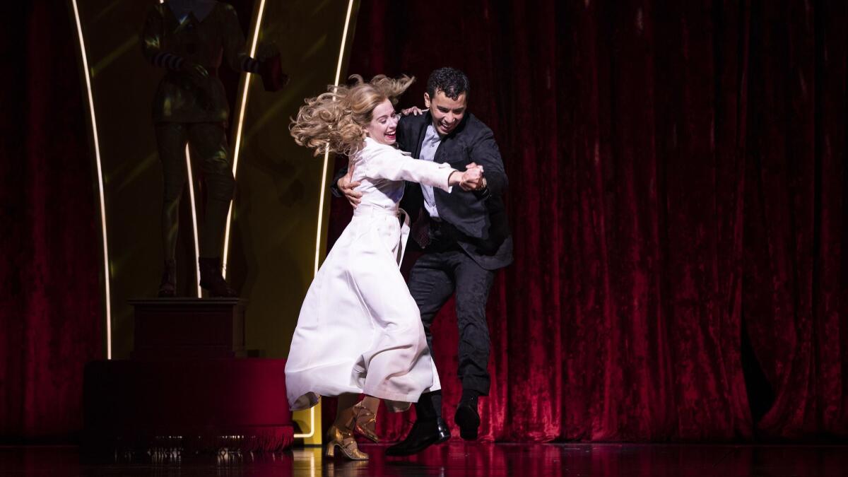 Shall we dance? Alyse Alan Louis and Conrad Ricamora during one of the musical numbers in "Soft Power."