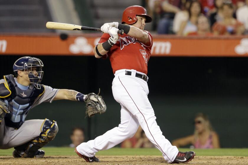 Angels first baseman Kole Calhoun singles in a run during the team's 11-2 win over the Tampa Bay Rays.