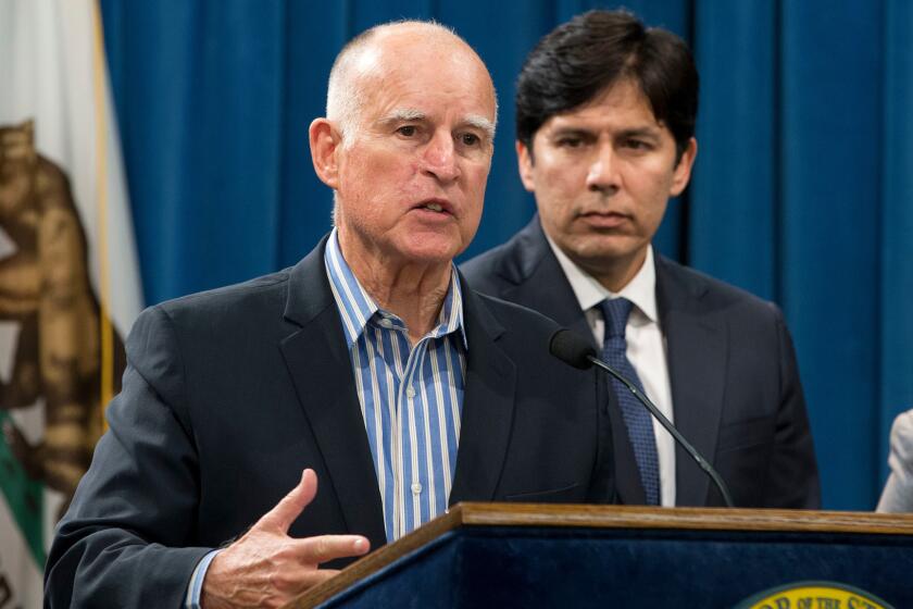 Gov. Jerry Brown announced during a news conference Wednesday that he would sign a pair of environmental bills approved by the Legislature that would reduce carbon emissions.