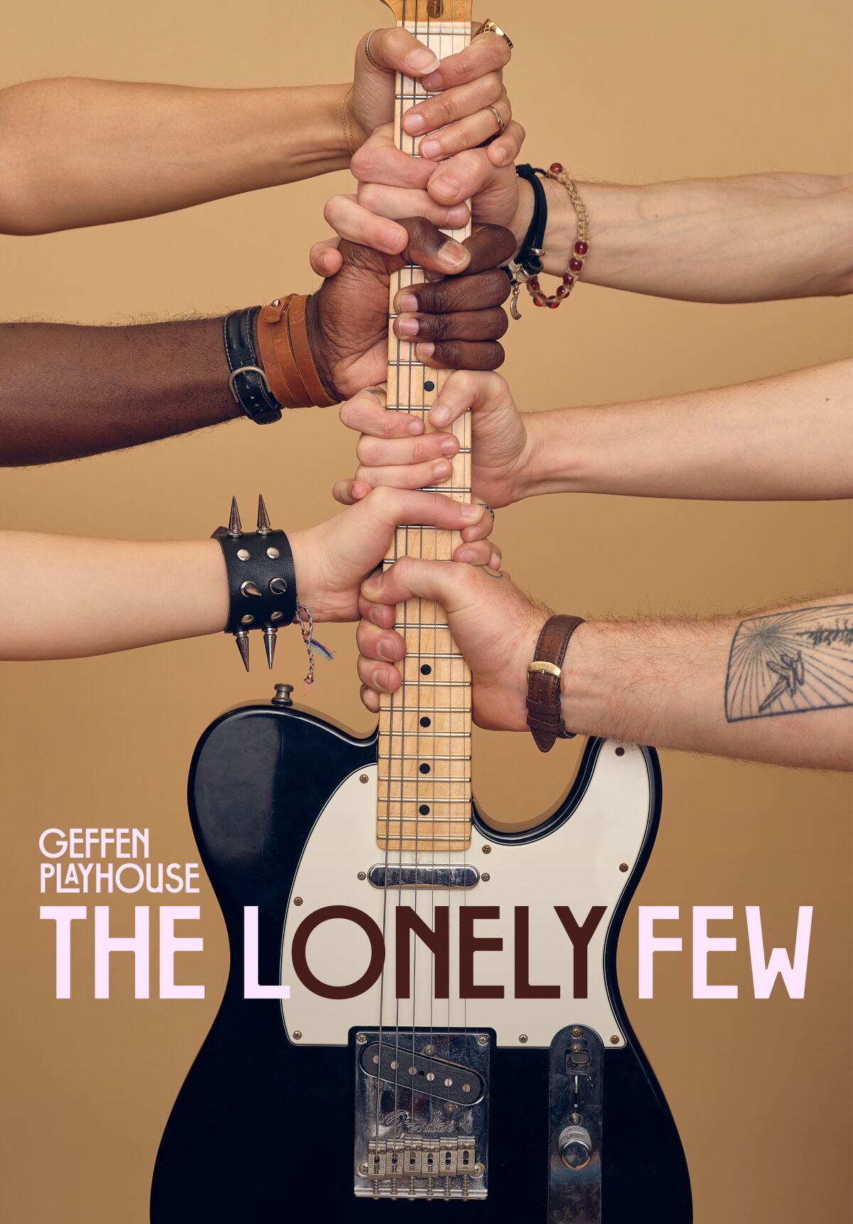 Multiple hands grasp the neck of a guitar in an image for "The Lonely Few."
