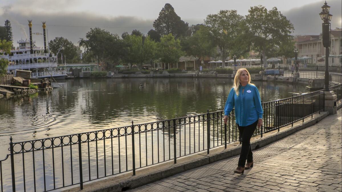 Kim Irvine is arguably the person most responsible for maintaining the look and feel of Disneyland. Irvine takes an early morning stroll through New Orleans Square, next to the Rivers of America before the park opens on April 25.