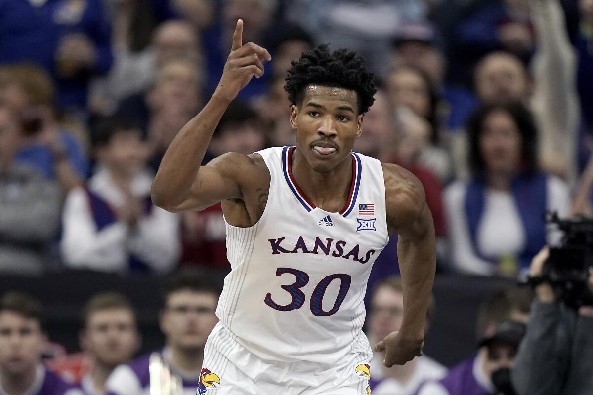 Kansas guard Ochai Agbaji celebrates during a Big 12 Conference tournament semifinal win over Texas Christian on March 11.