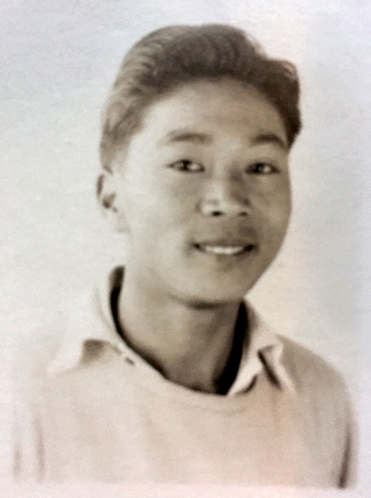 A portrait of the author's father as a teenager.