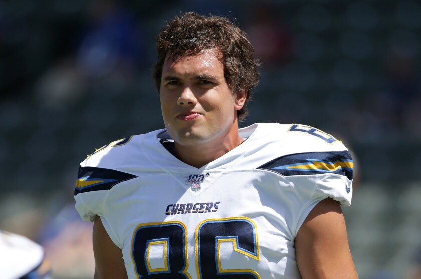 Chargers tight end Hunter Henry stands on the field during Sunday's game against the Indianapolis Colts.