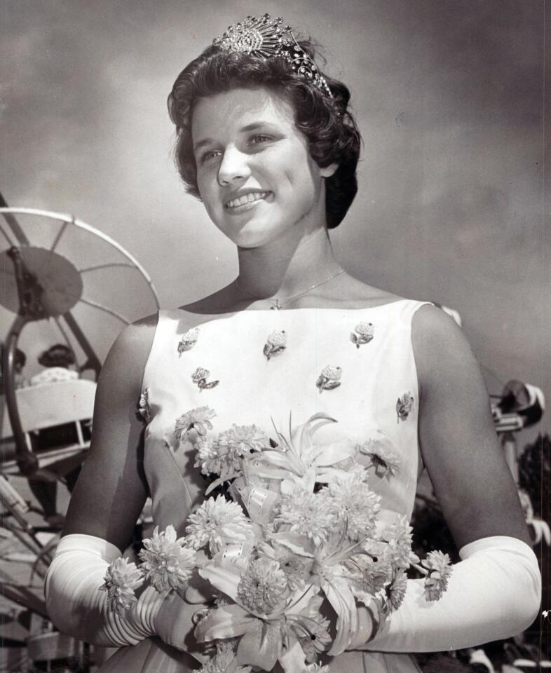 Doris Scott, 16, of Denton, smiles gracefully at 40,296 subjects after coronation as the Farm Queen at the 1964 Maryland State Fair.