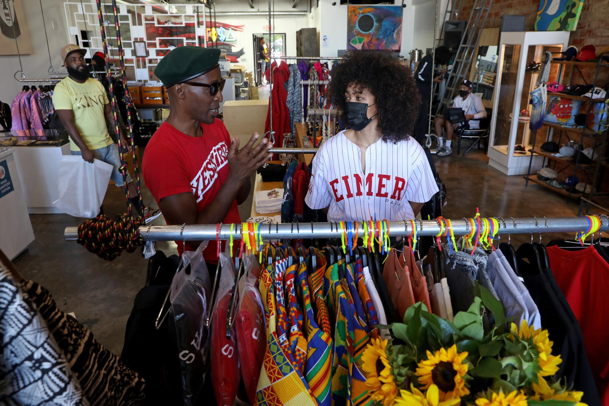 Patrick Henry Johnson and Alicia Teele attend the grand opening of Sole Folks.