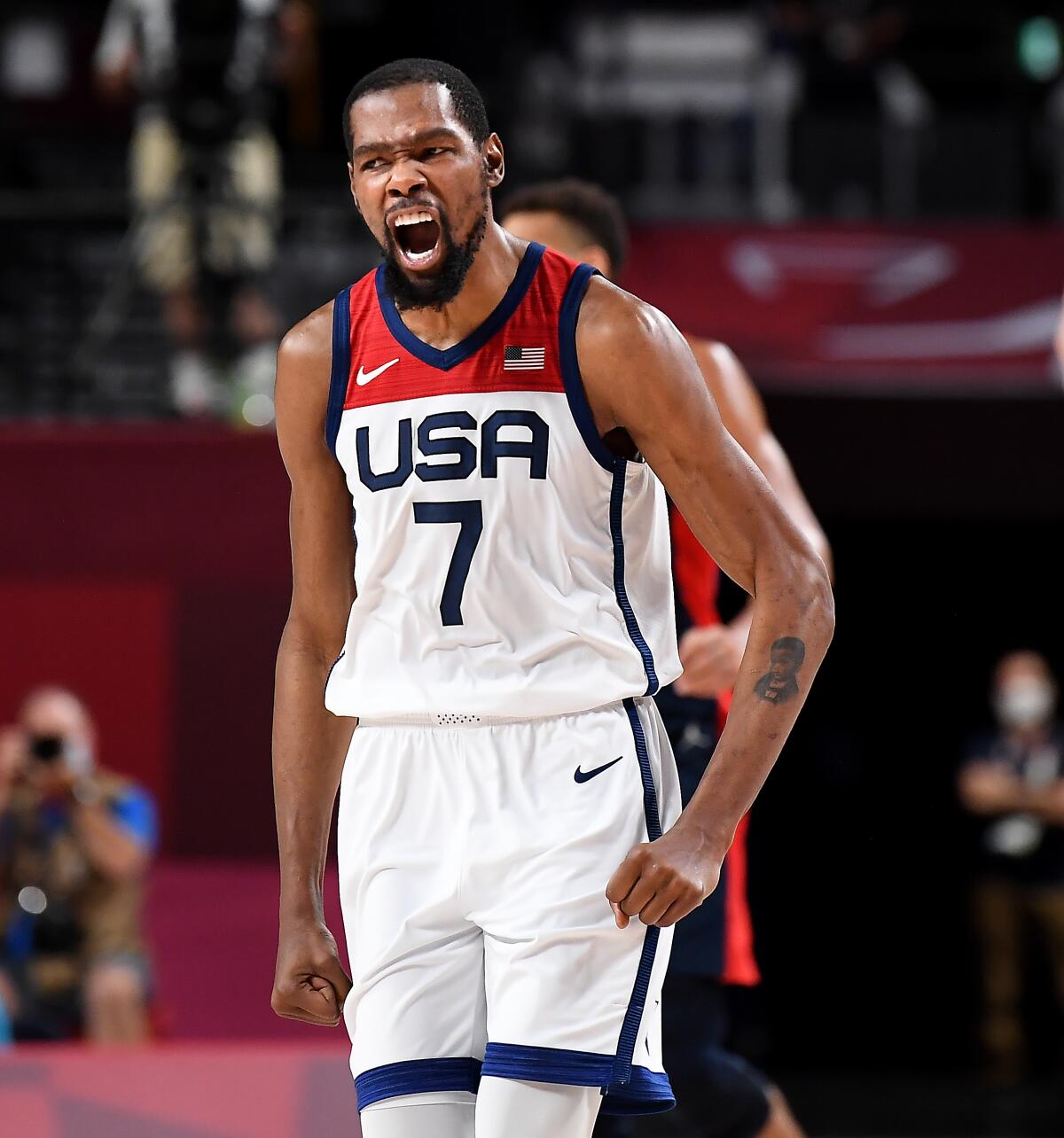 Kevin Durant celebrates after hitting a three-pointer against France in the gold medal game.