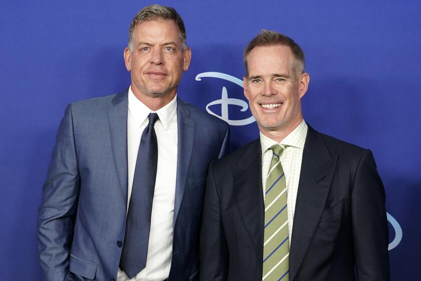 Troy Aikman, left, and Joe Buck attend the Disney 2022 Upfront presentation at Basketball City Pier 36