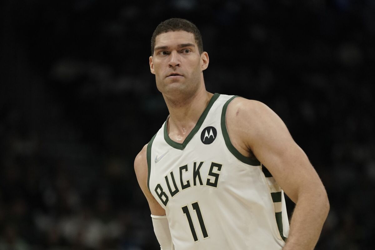 FILE - Milwaukee Bucks center Brook Lopez is shown during the first half of an NBA basketball game against the Brooklyn Nets, Tuesday, Oct. 19, 2021, in Milwaukee. Lopez has undergone surgery to address the back injury that has kept him from playing since the opening game of the season. The Bucks announced Thursday, Dec. 2, 2021, that Lopez had back surgery earlier that day in Los Angeles. (AP Photo/Morry Gash, File)