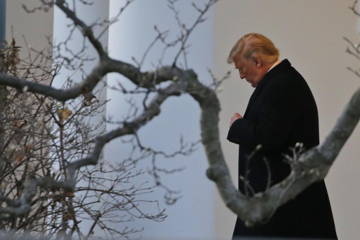 Hours before he is impeached, President Trump leaves the White House for a campaign rally in Battle Creek, Mich.