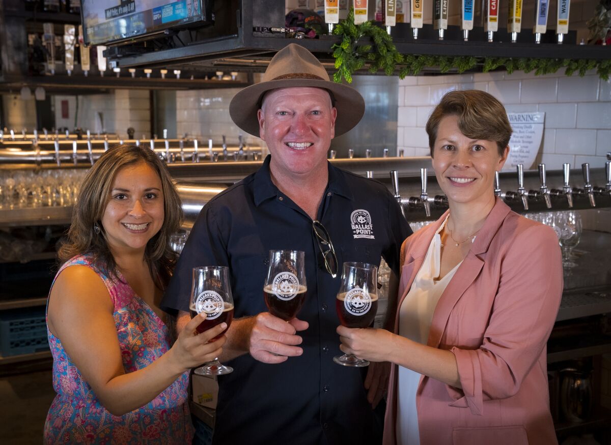 From left: Elia Gómez Smith; Brendon Watters, CEO of Ballast Point; and Skylar Holewinski.