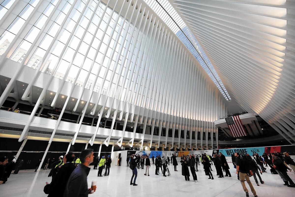 The World Trade Center transportation hub designed by Santiago Calatrava strains for higher meaning on a site where architectural memorials compete. Its ribbed interior can seem like the belly of a whale.