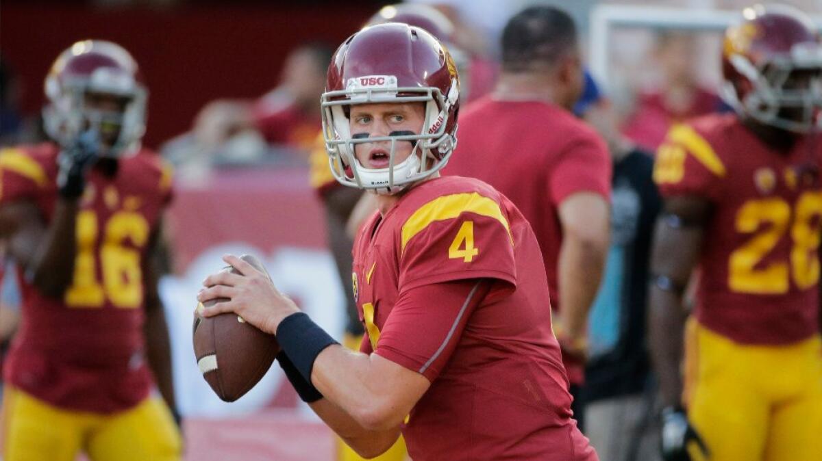USC quarterback Max Browne warms up before a game against Washington on Oct. 8.
