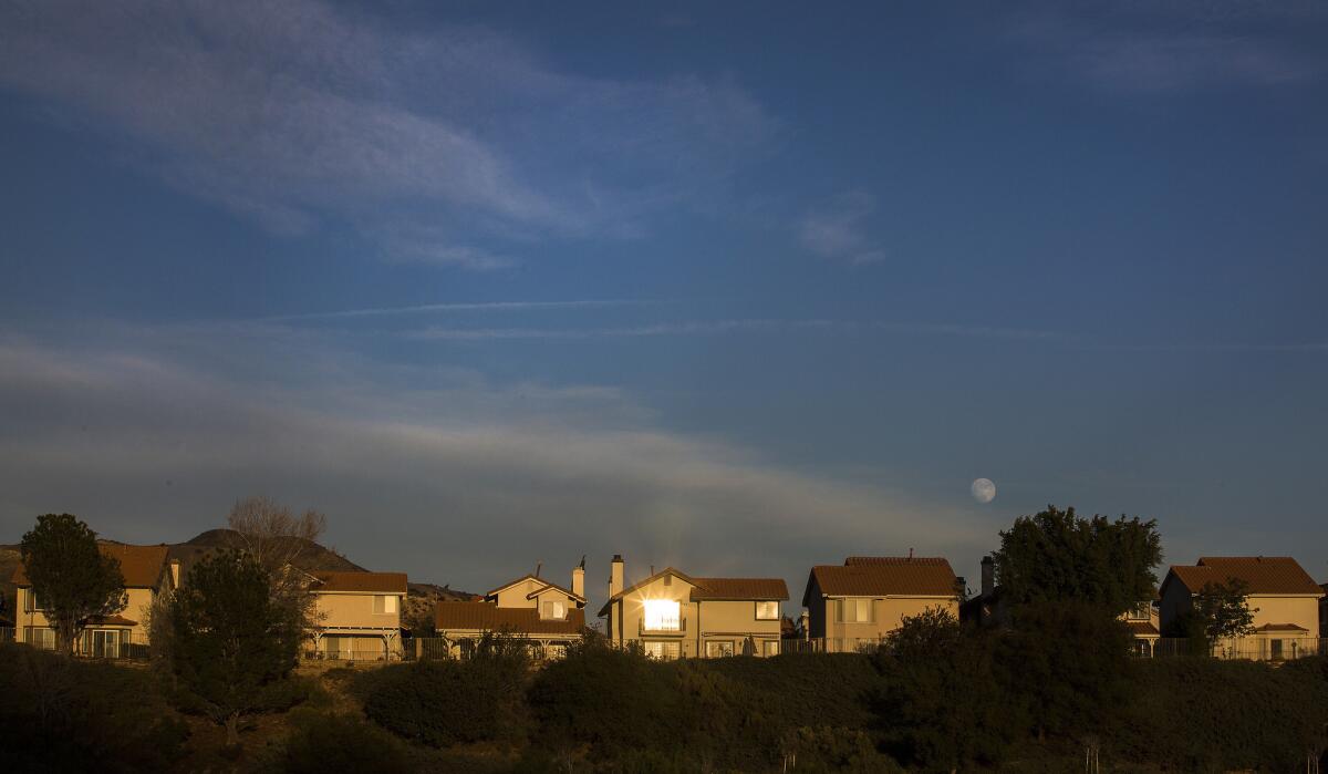 The late afternoon sun casts a warm glow on ridgeline homes in Porter Ranch. The comunity has survived wildfires, hurricane-force winds and a massive earthquake -- it is now contending with a disruptive natural gas leak.