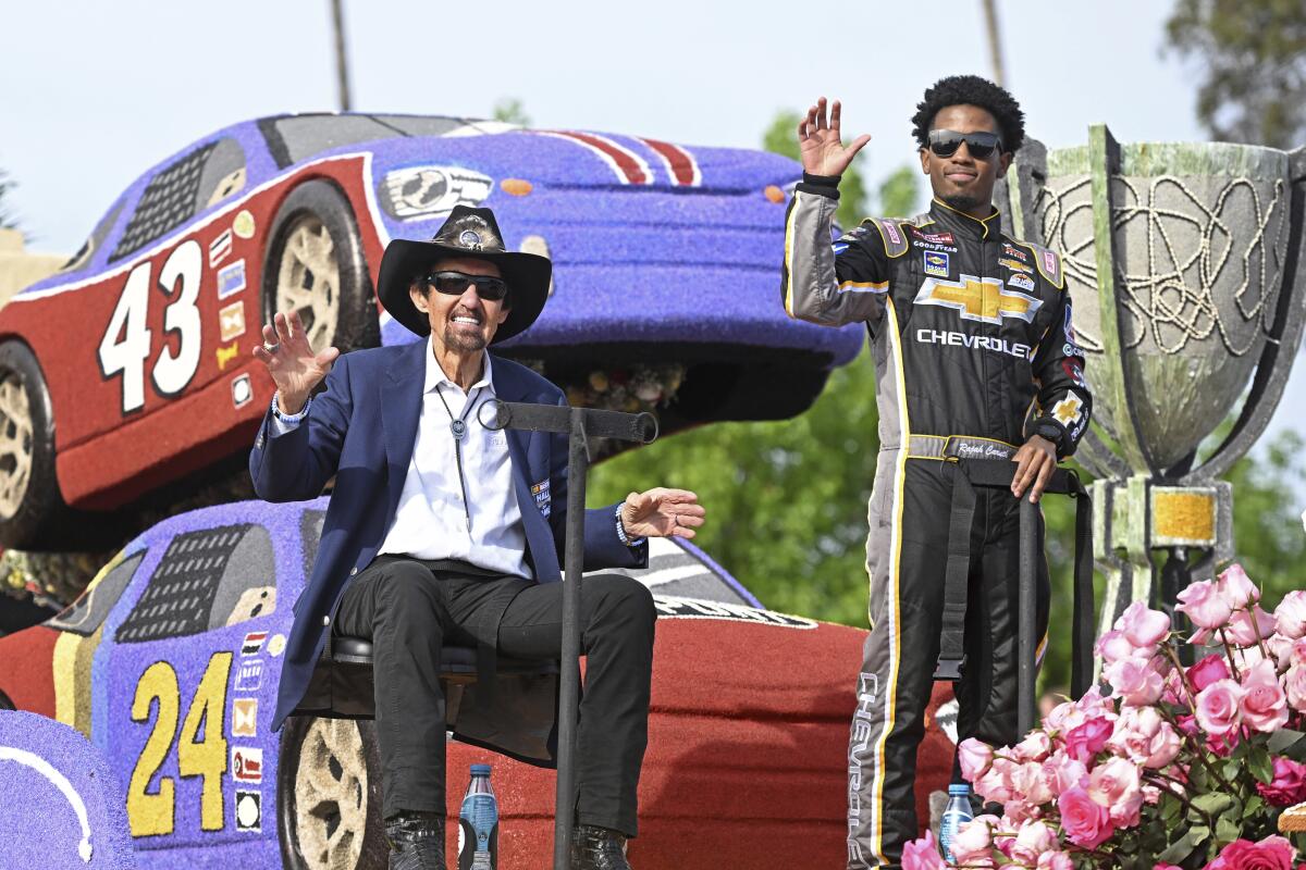 NASCAR legend Richard Petty and Rajah Caruth ride on NASCAR's float in the 134th Rose Parade on Jan. 2.