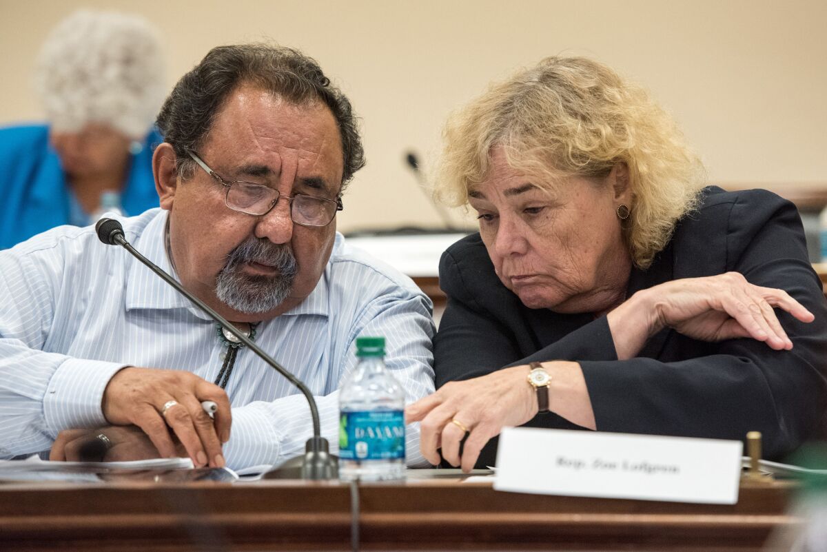 Reps. Raul Grijalva (D-Ariz.) and Zoe Lofgren (D-San Jose) confer at a forum on the detention of immigrant families Tuesday on Capitol Hill. Leading Democrats in Congress have called for an end to family detention.
