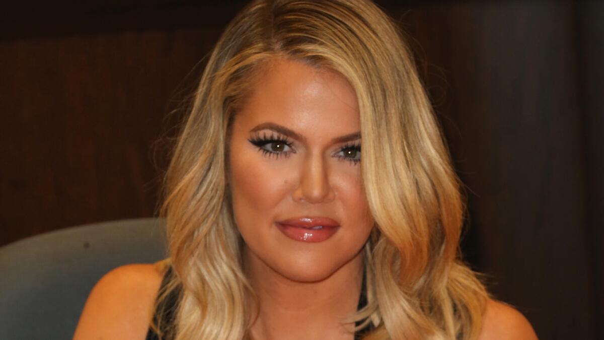 Khloe Kardashian signs her book "Strong Looks Better Naked" at an L.A. Barnes & Noble on Nov. 9.