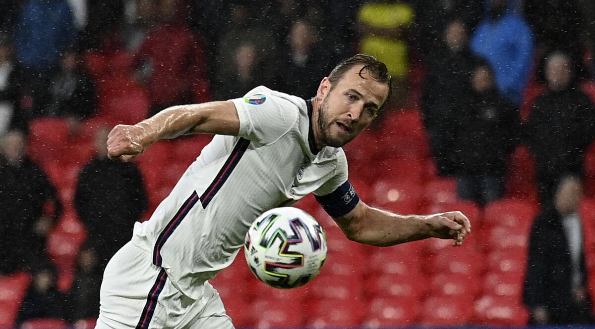 England's Harry Kane controls the ball 
